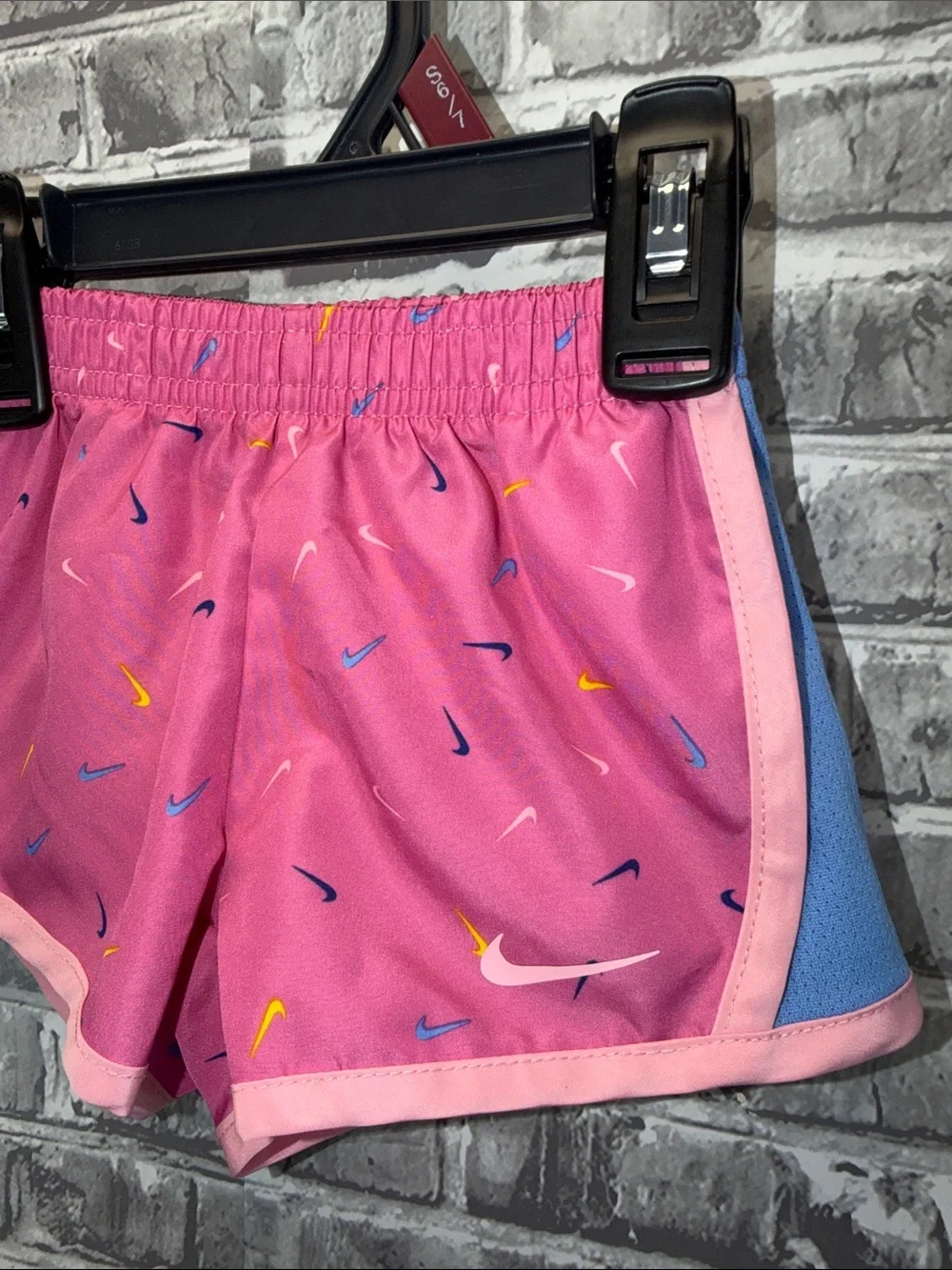 Nike Pink Girls' Shorts with Blue Panels and Multi-Color Swooshes